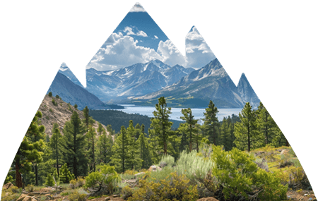 Nevada mountains and lake surrounded by trees.