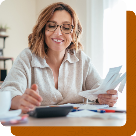 Woman smiling holding the receipts