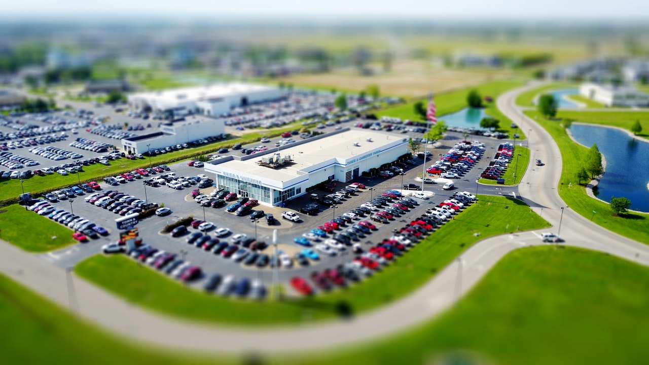 aerial view of a car dealership blurred edges